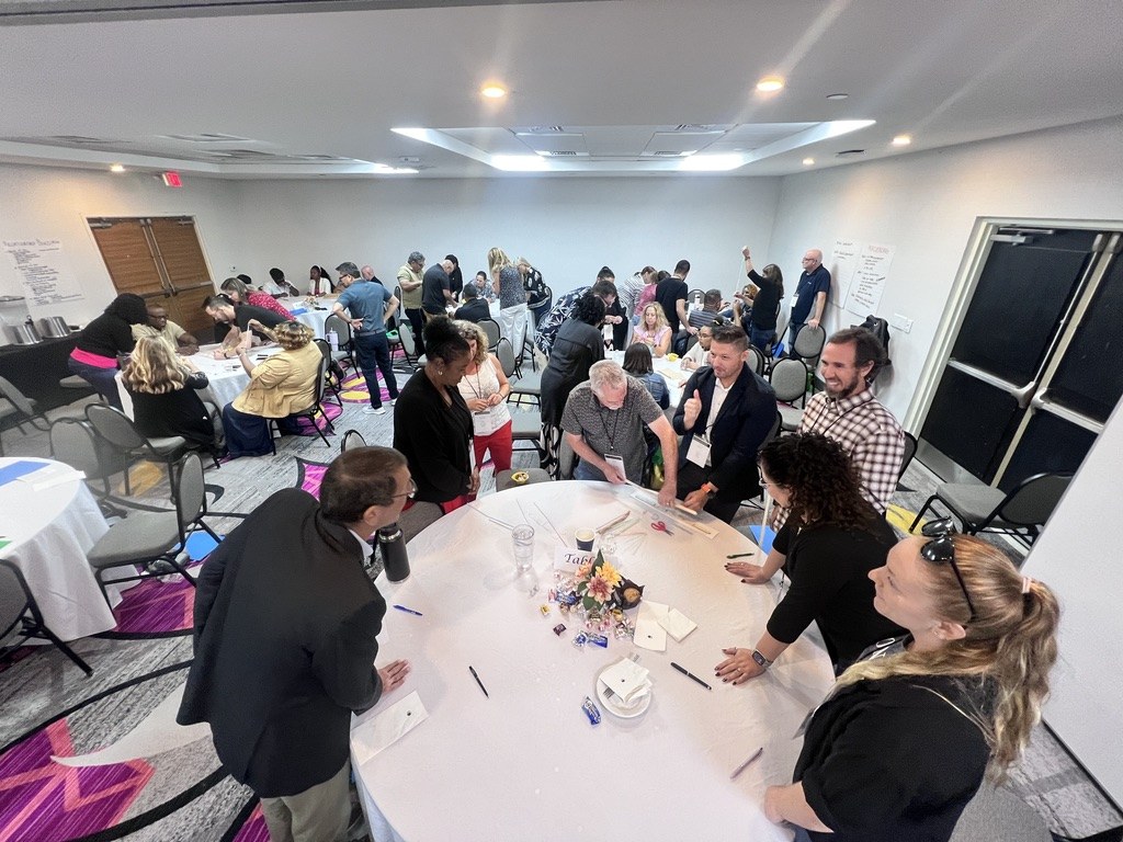 Participants collaborating during a facilitated MCG session